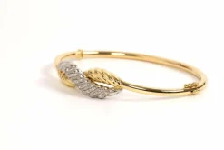 Bracelet Années 70 en or jaune et blanc 18 carats serti de diamants