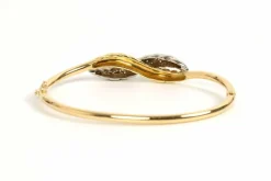 Bracelet Années 70 en or jaune et blanc 18 carats serti de diamants