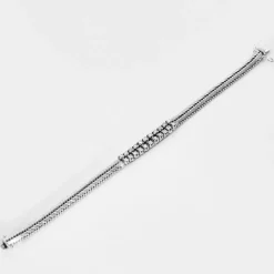 Bracelet années 60, or blanc et diamants