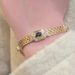 Bracelet Art déco en or jaune diamants et saphirs