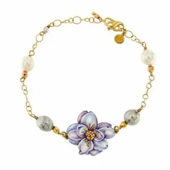 Bracelet avec fleur en émail et perles