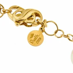 Bracelet avec fleur en émail et perles