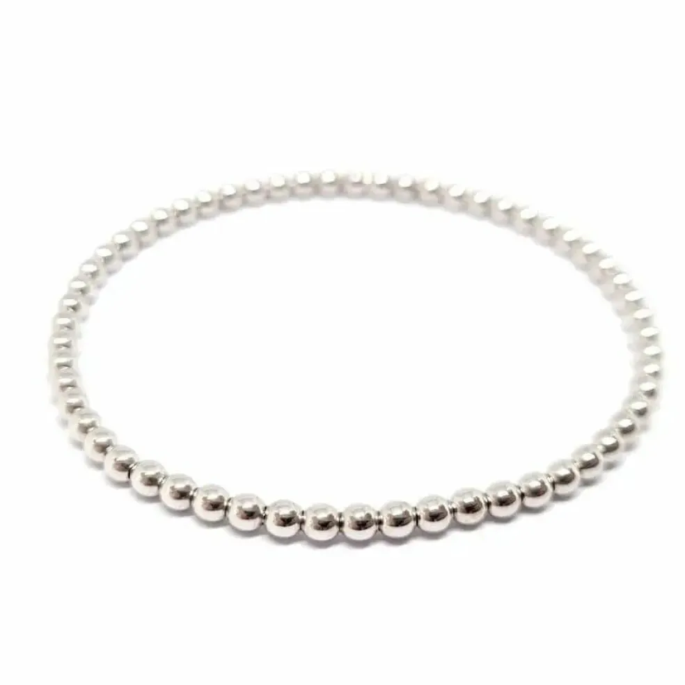 Bracelet boules or blanc