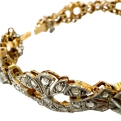 Bracelet design Art Déco en or jaune et platine avec diamants