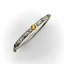 Bracelet édouardien en filigrane de diamants et saphir jaune en platine