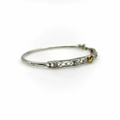 Bracelet édouardien en filigrane de diamants et saphir jaune en platine