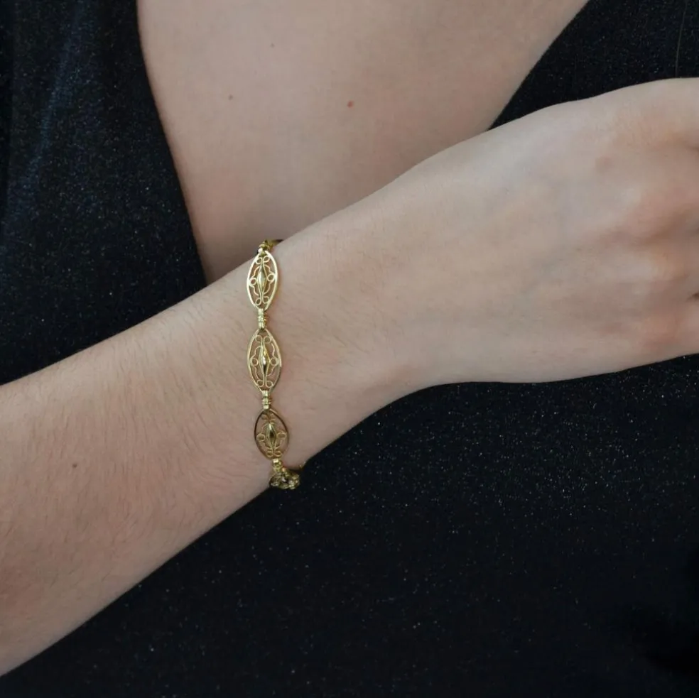 Bracelet en or jaune à maillons filigranés