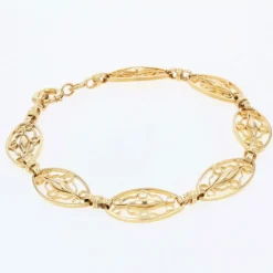Bracelet en or jaune à maillons filigranés