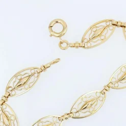 Bracelet en or jaune à maillons filigranés