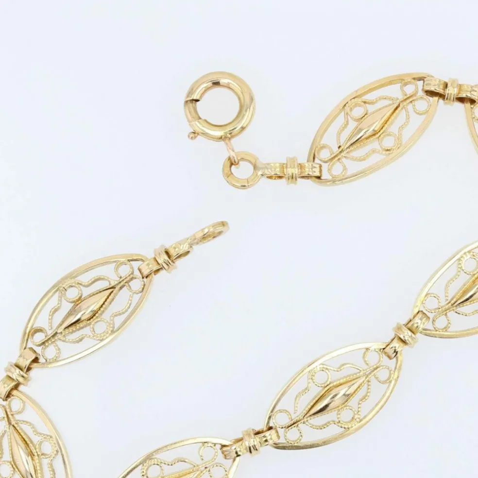 Bracelet en or jaune à maillons filigranés