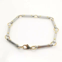 Bracelet en or jaune et acier