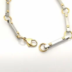 Bracelet en or jaune et acier
