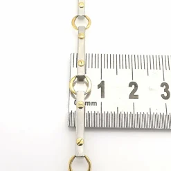 Bracelet en or jaune et acier