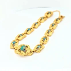 Bracelet en or jaune et turquoises