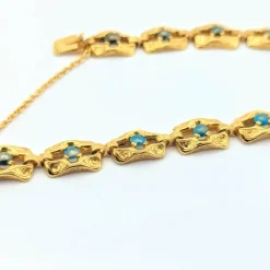 Bracelet en or jaune et turquoises