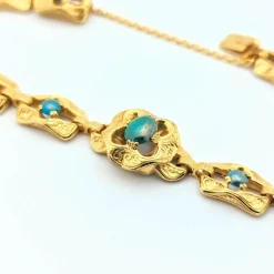 Bracelet en or jaune et turquoises