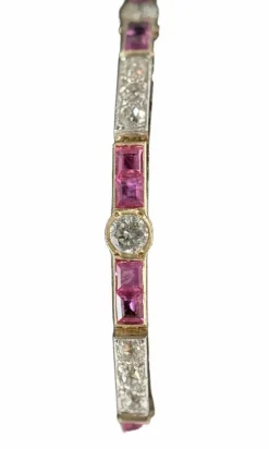 bracelet en or jaune 18K orné de rubis et brillants