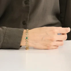 Bracelet en or jaune, émeraude et diamants