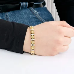 Bracelet en or jaune, or gris et diamants