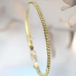 Bracelet en or occasion gourmette aplatie