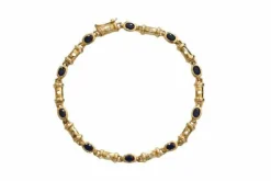 Bracelet En Or Orné De Diamants Et Saphirs