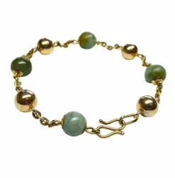 Bracelet en or rose et perles de jade