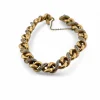 Bracelet gourmette ancienne or jaune et diamants