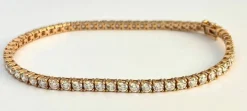 Bracelet ligne en or rose serti de 60 brillants