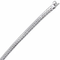 Bracelet ligne or blanc et diamants taille princesse.