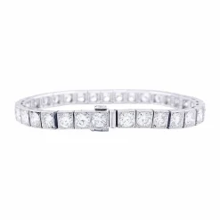 Bracelet ligne or blanc, platine, diamants.
