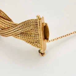 Bracelet manchette tressé en maille tissée or jaune