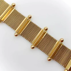 Bracelet moderne du milieu du siècle en or tissé 18 carats