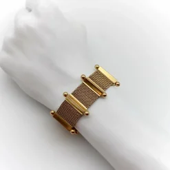 Bracelet moderne du milieu du siècle en or tissé 18 carats