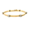 Bracelet moderniste en or jaune et gris, et diamants