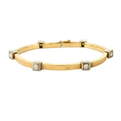 Bracelet moderniste en or jaune et gris, et diamants
