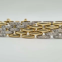 Bracelet or blanc et jaune 18 carats serti de diamants