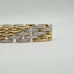 Bracelet or blanc et jaune 18 carats serti de diamants