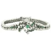 Bracelet or gris diamants et émeraudes