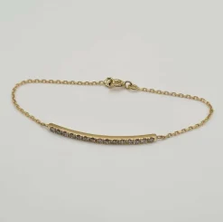 Bracelet or jaune 18 carats serti d’une barrette de diamants