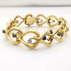 Bracelet or jaune diamants et saphirs