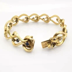 Bracelet or jaune diamants et saphirs