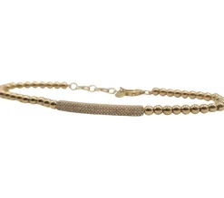 Bracelet or jaune serti d’une barrette de diamants
