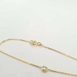 Bracelet or jaune serti d'un diamant