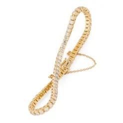 Bracelet rivière or jaune orné de diamant taille brillant