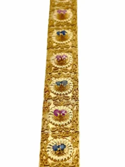 Bracelet rétro Brevetto en or jaune, rubis et saphirs