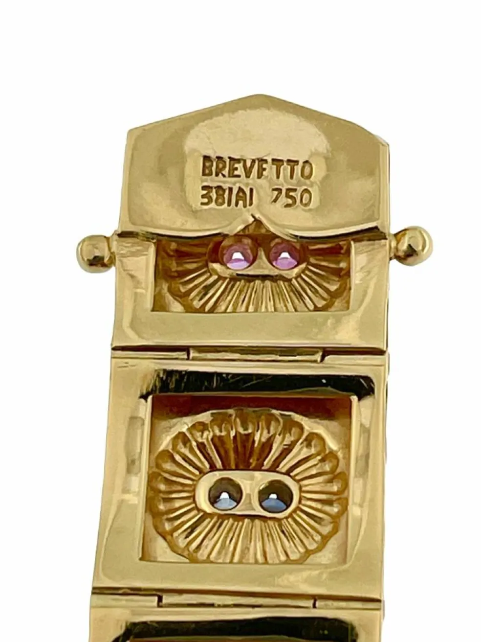 Bracelet rétro Brevetto en or jaune, rubis et saphirs