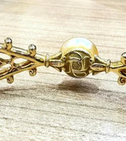 Bracelet signé Alessio Boschi , or , perles et diamants jaunes