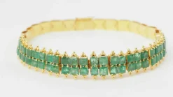 Bracelet souple en or jaune et émeraudes
