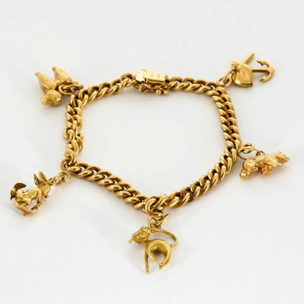 Bracelet souple or jaune et charms
