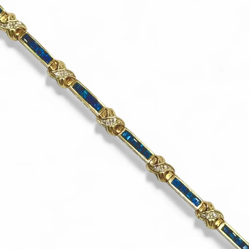 Bracelet souple or jaune, saphirs et croisillons